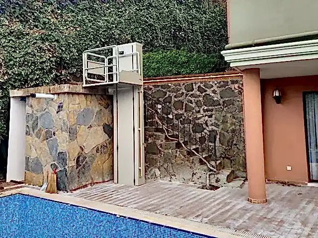 açık tip engelli asansörü